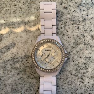 White and silver fossil watch